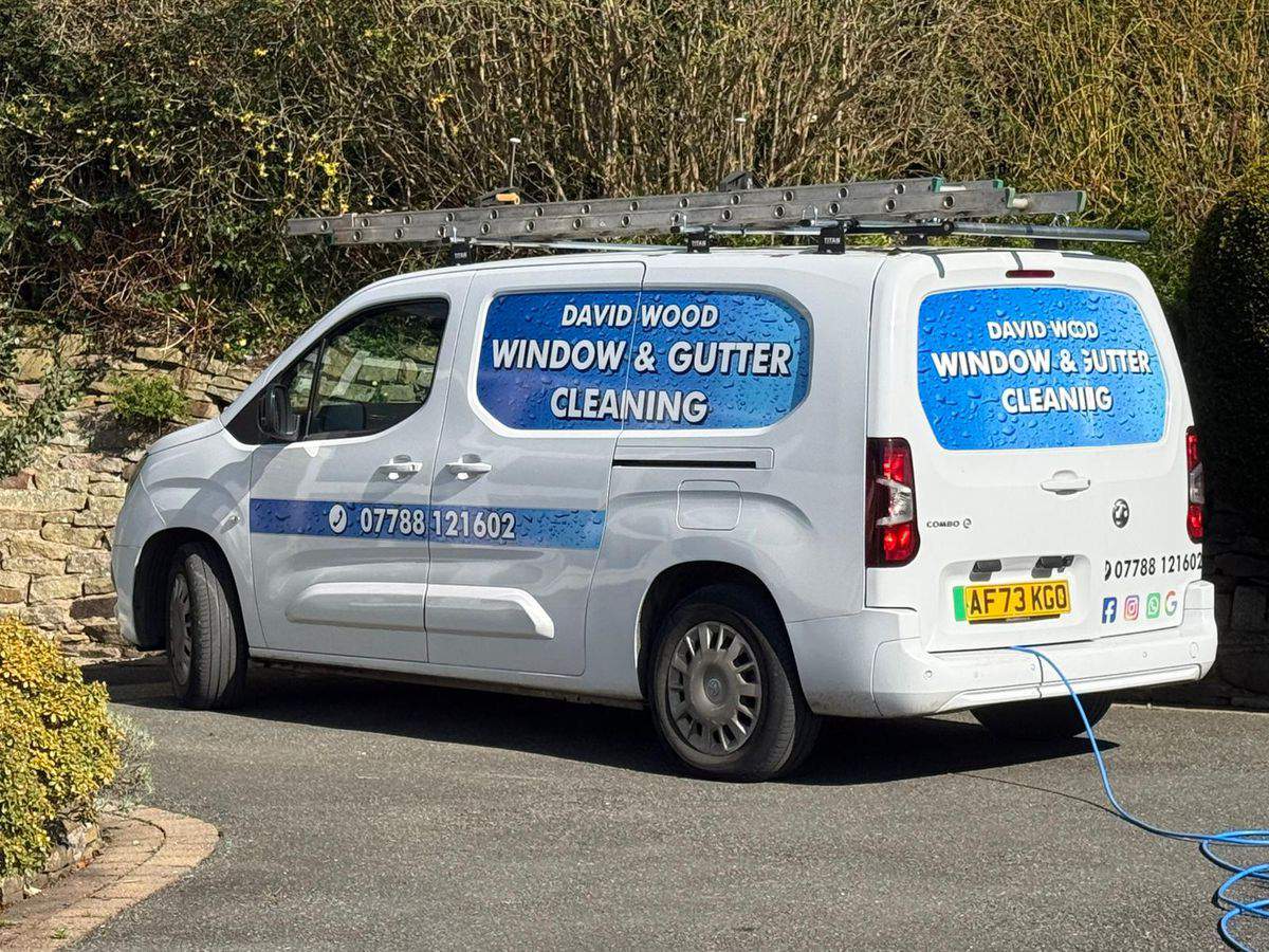 David Wood Window and Gutter Cleaning branded van - serving South Manchester since 1990
